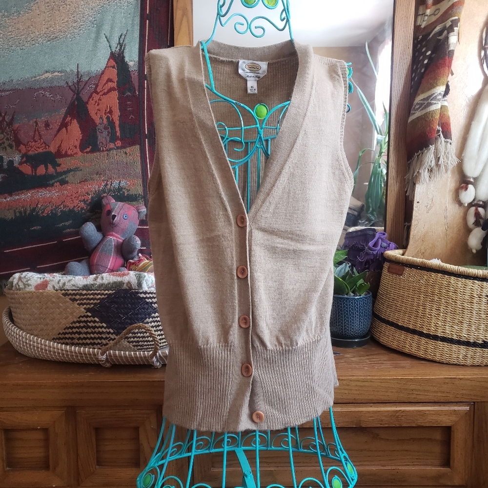 Merino wool button up vest.